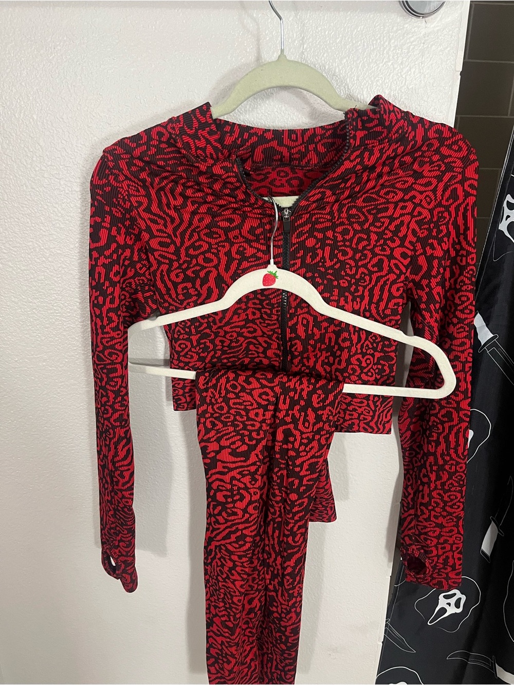 Red and Black Animal Print Zip-Up Women’s Top